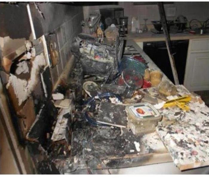 fire damaged counter tops in a kitchen