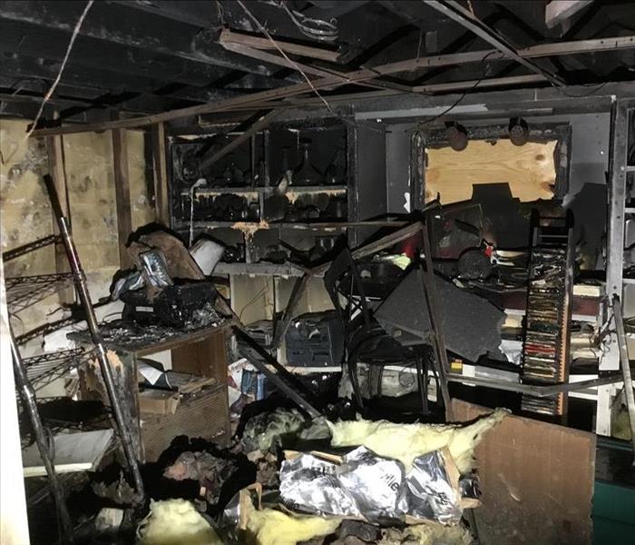 badly burned interior of garage destroyed walls and ceiling